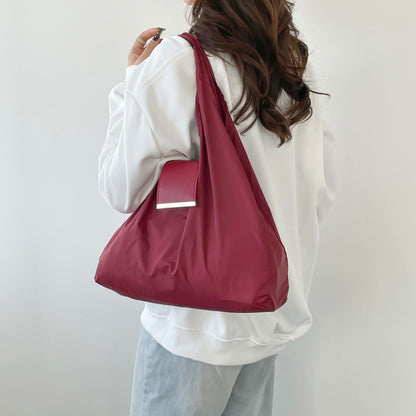 Verlissima™ — The Keychain That Transforms Into a Bag