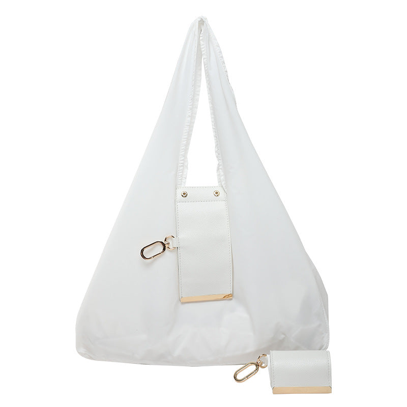 Verlissima™ — The Keychain That Transforms Into a Bag
