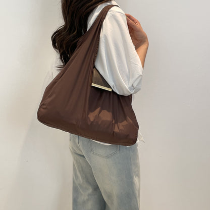 Verlissima™ — The Keychain That Transforms Into a Bag